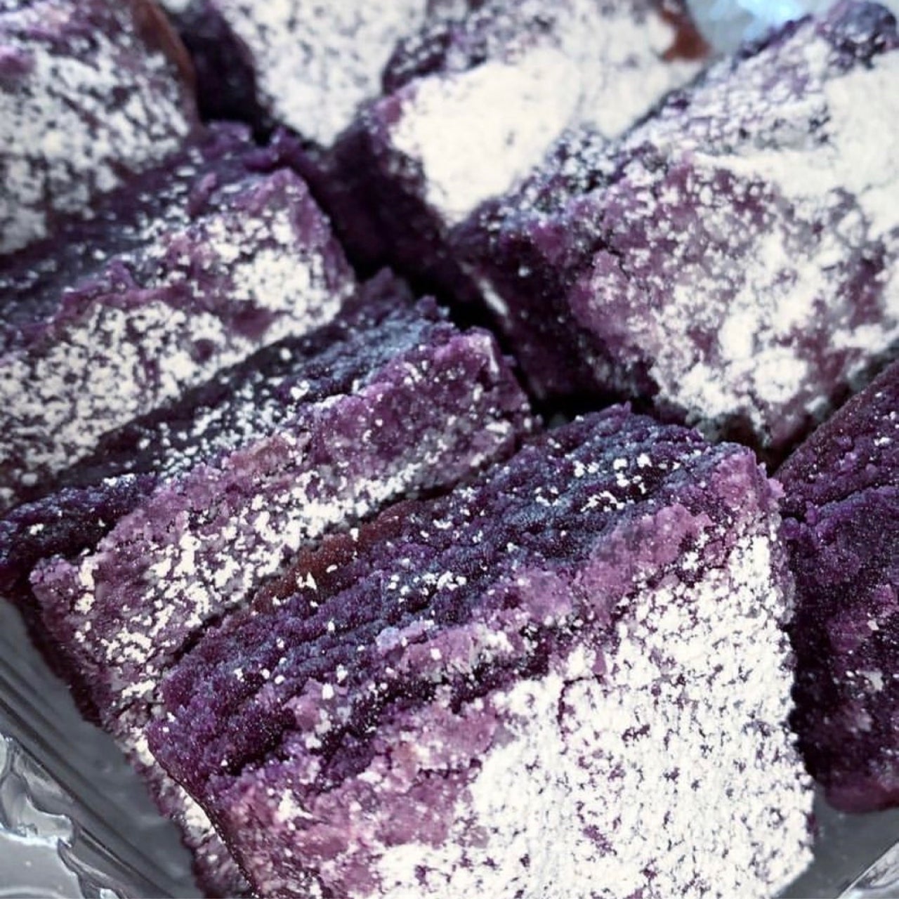 Pistachio dessert bars topped with nuts